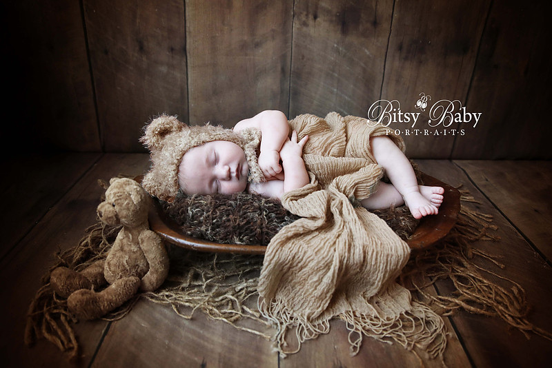 Newborn baby boy in a teddy bear bonnet photo session with Bitsy Baby Portraits, Maternity and Newborn Photographer, Athens, GA.